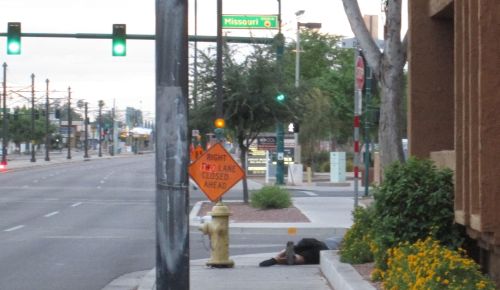 homeless people sleeping on 19th Avenue near Valley Metro Light Montebello Rail Station  at Christown Mall or Spectrum Mall