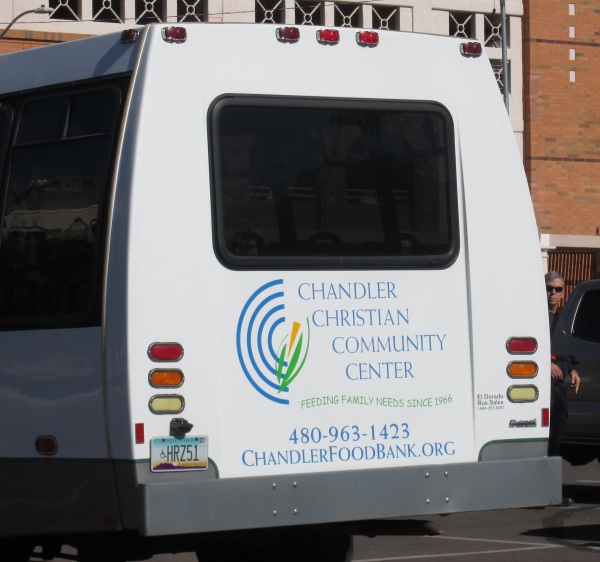 Chandler Christian Community Center van or bus with license plate Arizona HRZ51 illegally parked at Chandler Arizona Fire Department HQ parking lot, Trinity Donovan