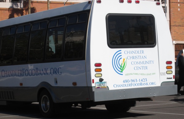 Chandler Christian Community Center van or bus with license plate Arizona HRZ51 illegally parked at Chandler Arizona Fire Department HQ parking lot, Trinity Donovan